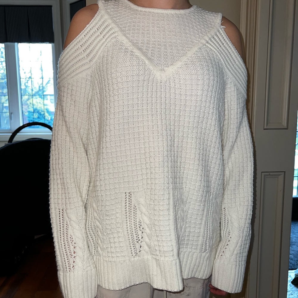 Open shoulder white knit sweater